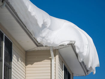 snowy-roof - What Happens When It Snows On The Roof? -Ice Dam Removal Services in Minneapolis
